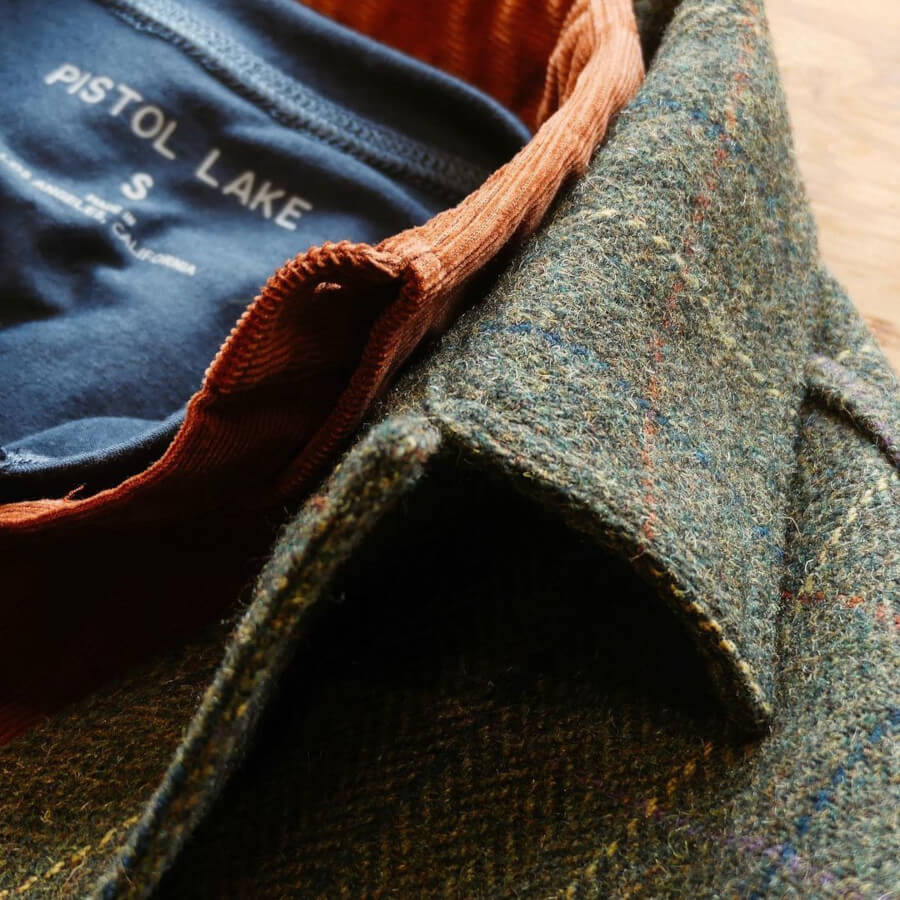 A Pistol Lake henley, Gitman Vintage corduroy shirt, and Taylor Stitch tweed jacket layered