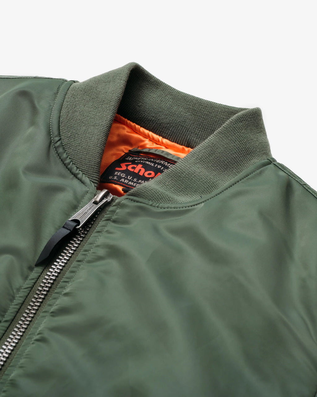 Collar detail shot of sage bomber jacket. See product details for more information.