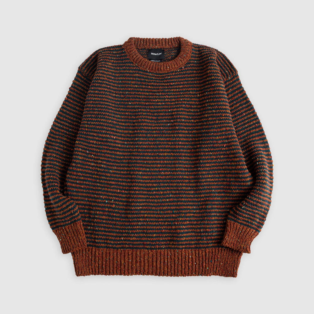 Broken Finger Dream in Cinnamon—black striped sweater on brown field. Flat lay shot. See product description for more details.