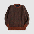 Broken Finger Dream in Cinnamon—black striped sweater on brown field. Flat lay shot. See product description for more details.