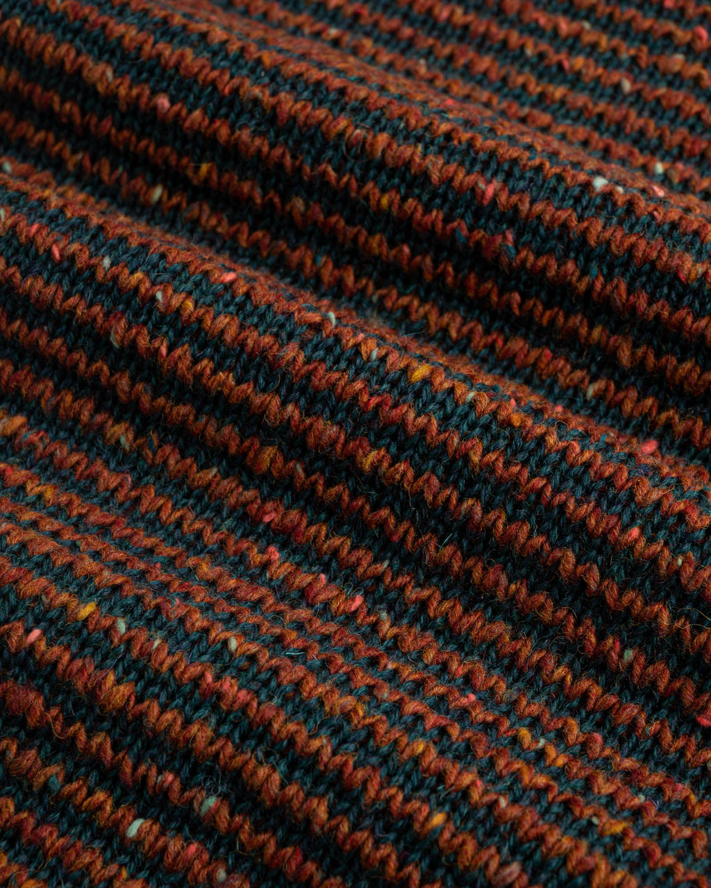 Close-up of black-and-brown striped wool fabric used for Broken Finger Dream sweater in Cinnamon. See product details for more information.