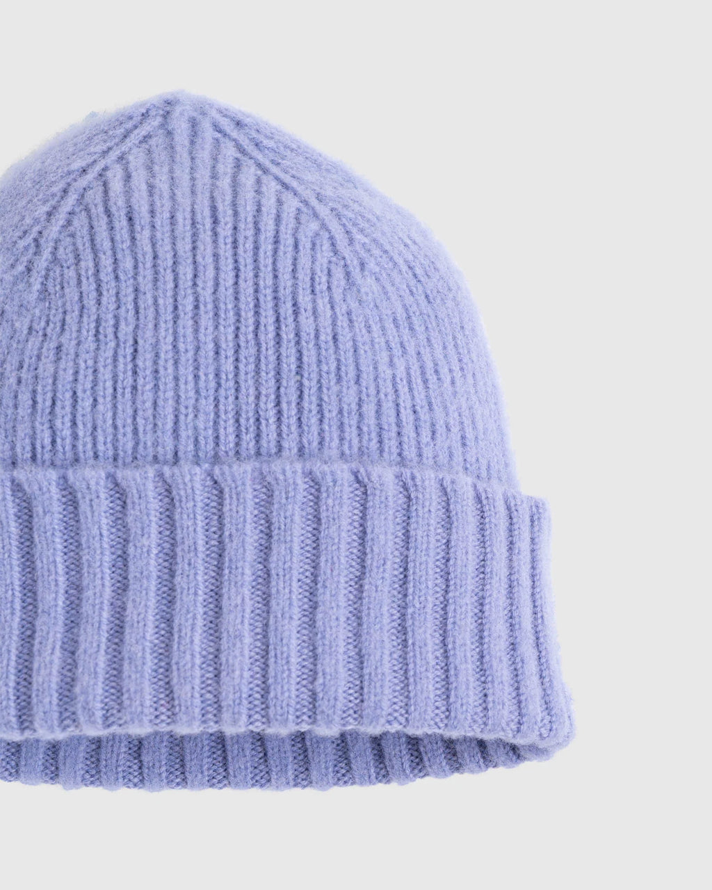 Slightly closer shot of lavender wool watch cap with cuff, showing some of merino wool texture. See product details for more information.